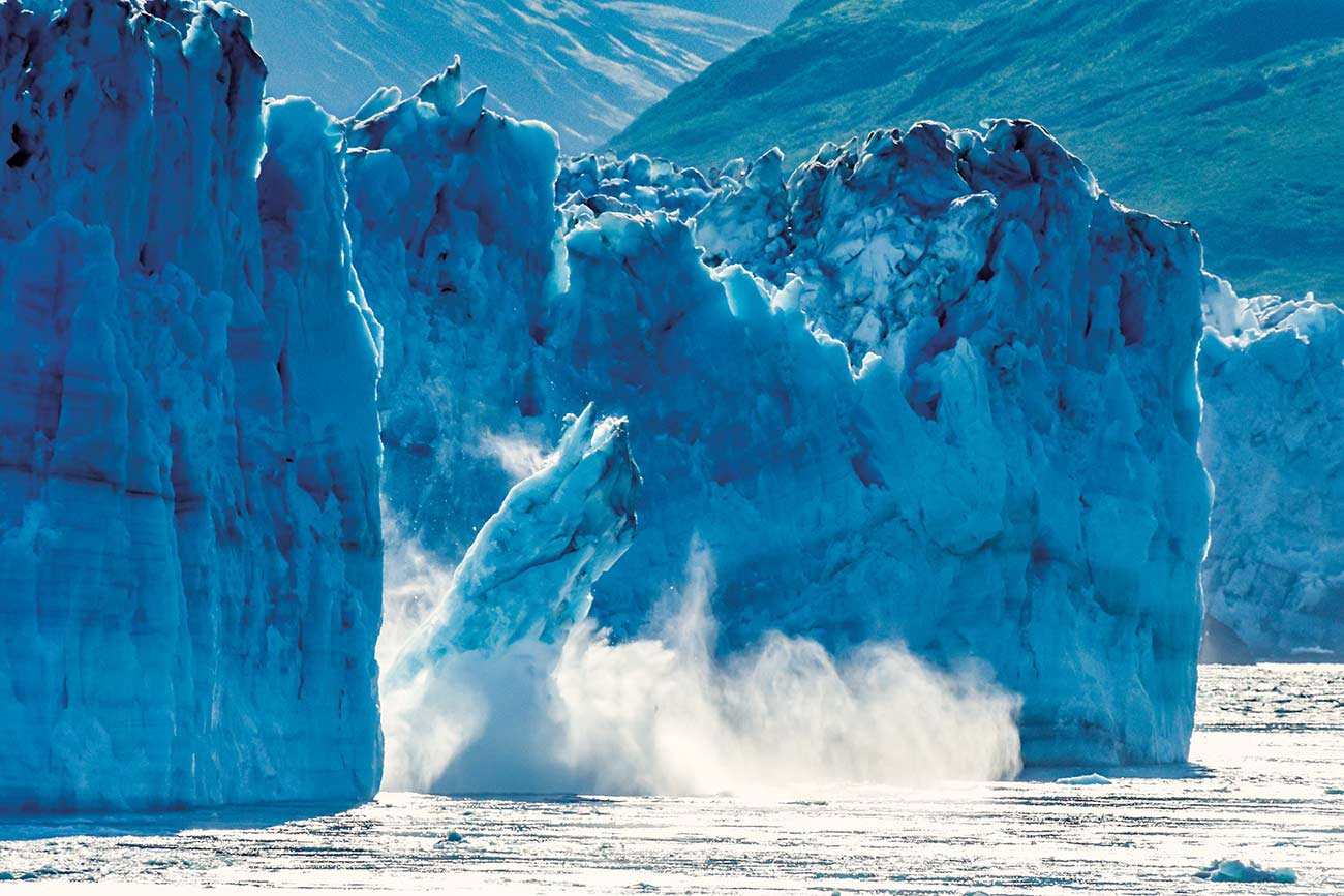Icebergs crashing into the sea