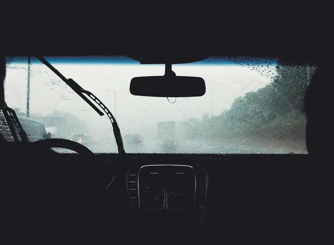 Looking out the window of a car on a rainy day