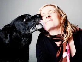 Megan Alderson gets a lick from a happy dog
