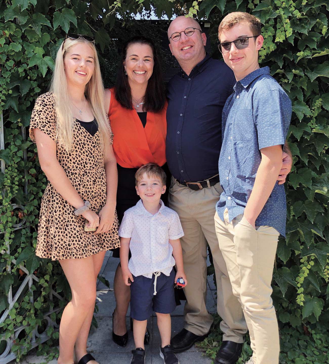 Portrait of the Ferguson family with Zoe, Bridget, Oliver, Elijah and Carter Ferguson