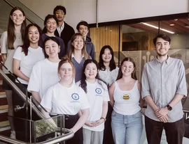 Scholarship group photo in a stairwell - listing