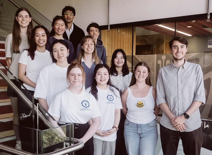 Scholarship group photo in a stairwell - listing