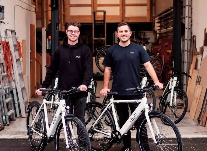 Shutl co-founders Connor Read and Aidan Smith with Shutl bikes