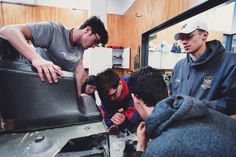 Students building a race car on the University of Auckland campus