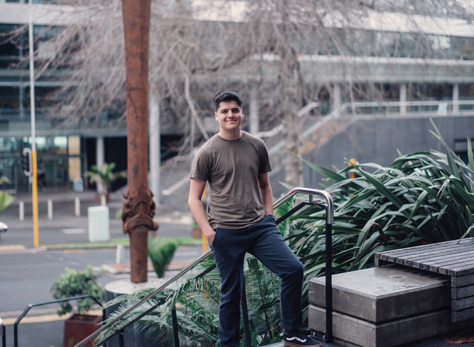 Tom Tamaira Standing on a step in central Wellington lisiting.png