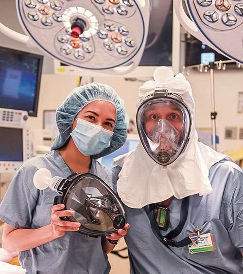 Two frontline healthcare workers in PPE