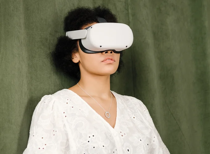 Woman wearing a VR headset - listing