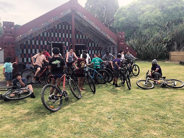 Young people participating in mountain biking