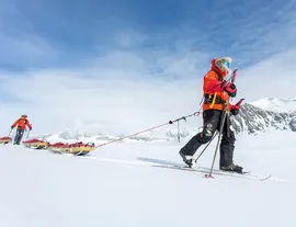 guy skiiing the the snow - ends of the earth - listing.webp
