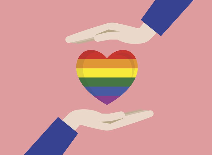 Illustration of a rainbow heart with a hand above and a hand below it on a pink background